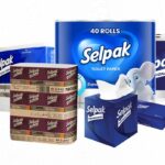 A variety of Selpak brand tissue and paper products, including a 40-roll pack of toilet paper, boxed facial tissues, and folded paper towels, arranged together against a light background.